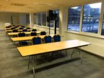 8ft Rectangular Table with Blue Padded Chairs