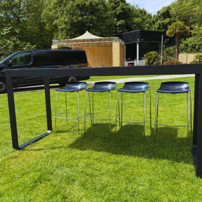 Flow Black Bridge Table with Milano Low Back Black Stools