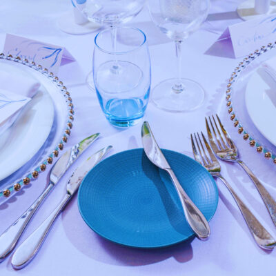 Oslo Cutlery with Blue Side Plate, Ice Blue Water Glass and Silver Beaded Charger Plate